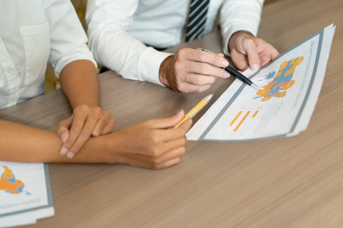 close-up-of-multiethnic-managers-discussing-international-sales (1) (2)-min